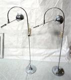 Lot 418:  Two Chromed Steel Arched Neck Floor Lamps. ROBERT SONNEMAN style. Cantilever Arm with Ball Shade.: Dimensions:  H: 56 inches: W: 31 inches: D: 11.5 inches --- 