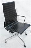 Lot 426:  Charles EAMES for Herman Miller Aluminum Group Tall Back Desk Office Chair. Black seat & back. Black finish on arms. Herman Miller tag.: Dimensions:  H: 40.5 inches: W: 22.5 inches: D: 22 inches --- 