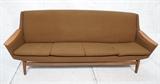 Lot 466:  Norway Modern Teak Couch Sofa. Sloped arm with teak arm rest. Brown fabric upholstery. Teak legs with stretcher.: Dimensions:  H: 32 inches: W: 86.5 inches: D: 29 inches --- 