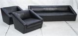 Lot 475:  3pc Black Leather THAYER COGGIN Sofa & 2 Lounge Chairs.  Perforated Black Leather Upholstery. Low Wedge Shaped Silhouette. Thayer Coggin label: Dimensions:  H: 23.5 inches: W: 86 inches: D: 33 inches --- 