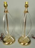 Lot 495:  Pr Tall Lucite Table Lamps. 3 Bowed tubes with Domed brass base and cap.: Dimensions:  H: 24 inches: W: 8 inches --- 
