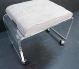 Lot 521:  70's Modern Lucite Vanity Stool.  Hill Manufacturing.  1/2 inch lucite.  Chrome trim.: Dimensions:  H: 18 inches: W: 21.75 inches: D: 14 inches --- 
