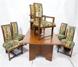 Lot 538:  Frank Lloyd Wright Dining Set Table and 6 Chairs.  Table has Talisman edge.  2 arm Chairs.  Tall back chairs. Two 18" leaves.: Dimensions:  H: 28.75 inches: W: 64 inches: D: 42.25 inches --- 