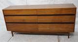 Lot 543:  Danish Modern Teak Low Dresser Chest. Rosewood Handle Trim.  Tapered Legs.: Dimensions:  H: 30 inches: W: 66 inches: D: 17 inches --- 