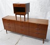 Lot 556:  2pc Danish Modern Teak Low Dresser & Night Stand. Nine drawer low dresser. Open night stand with one drawer. Tapered peg legs. Wood pulls: Dimensions:  H: 32.75 inches: W: 72 inches: D: 17 inches --- 