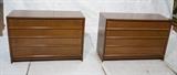 Lot 557:  Pr American Modern ROBSJOHN GIBBINGS style Dresser Chests. Horizontal Wood Pulls. Four drawers. Not marked.: Dimensions:  H: 32 inches: W: 48 inches: D: 19 inches --- 