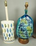 Lot 570:  2pc Italian Pottery Table Lamps. 1. Blue & Aqua with raised applied design. Wood base 2. White oval with colorful leaf design. Painted metal base. Largest ceramic stands 20" H. : Dimensions:   --- 