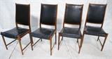 Lot 577:  Set 4 Danish Modern BRUKSBO Rosewood Dining Chairs. Black Leather. Tall back side chairs have inset leather front & back. Delicate tapered peg legs. Torbjorn Afdal for BRUKSBO. Paper label Georg Jensen Inc. : Dimensions:  H: 37.25 inches: W: 19 inches: D: 20 inches --- 