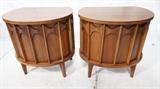 Lot 584:  Pr Oval form BRASILIA Side Tables Night Stands. Walnut American Modern with Rosewood Accents. Single interior drawer. On raised legs Not marked.: Dimensions:  H: 25.25 inches: W: 25 inches: D: 17 inches --- 