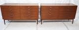 Lot 586:  Pr Danish Modern Teak Dressers. Ten Drawer Low Chests. Recessed wood pulls. Raised on tapered legs. Hans Wegner style. : Dimensions:  H: 34 inches: W: 59 inches: D: 18.5 inches --- 