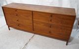 Lot 591:  Modernist Eight Drawer Dresser Chest. Wood hourglass pulls. Knoll or Jens Risom style: Dimensions:  H: 31.75 inches: W: 71 inches: D: 18 inches --- 