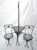Lot 617:  Outdoor Iron Tete a Tete.  2 seats and attached table.  Adjustable height arm.: Dimensions:  H: 73 inches: W: 57 inches: D: 25 inches --- 