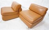 Lot 665:  Pr Tan Leather Lounge Chairs. Thick Cushions. Contemporary. : Dimensions:  H: 28 inches: W: 29 inches: D: 33 inches --- 