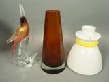 Lot 675:  3pc Italian Murano Glass Lot. VETRI White vessel. Unsigned Cased Amber Glass. Murano style Cockatiel sculpture with gold internal designs.: Dimensions:  H: 14.5 inches: W: 7 inches: D: 6 inches --- 