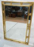 Lot 681:  Decorator Gilt Wood Wall Mirror. Beveled Frame with Gilt Wood Star Details.: Dimensions:  H: 50 inches: W: 34 inches --- 