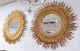 Lot 683:  Pr Sunburst Gilt Finish Wall Mirrors. Same frame but colors are different. La Barge style.  Beveled mirror. : Dimensions:  H: 42 inches: W: 42 inches --- 