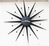 Lot 686:  Key Wind German Metal Starburst Clock.  Marked: Dimensions:  H: 28 inches: W: 28 inches --- 