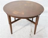 Lot 700:  American Modern JOHN STUART Walnut Occasional Table. "X" Base Stretcher. : Dimensions:  H: 22 inches: W: 32 inches: D: 32 inches --- 
