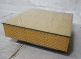 Lot 709:  Glass Top Baughman style Cube Woven Rattan Coffee Table. Brushed Steel Base: Dimensions:  H: 14.5 inches: W: 38 inches: D: 38 inches --- 