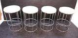 Lot 729:  Set 4 Milo Baughman Style Bar Stools.  White vinyl seats.  Tubular Chrome.: Dimensions:  H: 25 inches: W: 15 inches --- 