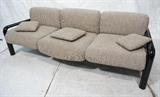 Lot 730:  Knoll Gae Aulenti Sofa Couch.  Black metal Frame.  Deep seats.: Dimensions:  H: 32 inches: W: 88 inches: D: 34 inches --- 