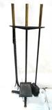 Lot 731:  Donald Deskey Style Fireplace Tools.  Brass capped.  Tri base. Flextong.: Dimensions:  H: 33.5 inches: W: 12.5 inches: D: 7.5 inches --- 