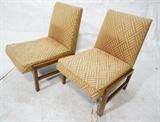 Lot 736:  Pair Dunbar Style Lounge Chairs. Armless with wood frames.: Dimensions:  H: 34 inches: W: 25 inches: D: 27 inches --- 