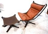 Lot 740:  Brown Leather Modernist Norway Falcon Chair & Ottoman. Laminated Wood Frame with chrome rings Vatne, Norway label. : Dimensions:  H: 39 inches: W: 30 inches: D: 33 inches --- 
