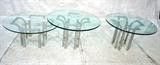 Lot 746:  3pc Round Glass Top Tables. Aluminum Base Coffee Table with 5/8" thick Glass Top. Pair of matching Aluminum Side Tables with 3/4" thick glass tops. Bowed aluminum base painted silver. : Dimensions:  H: 21.5 inches: W: 35.5 inches: D: 35.5 inches --- 