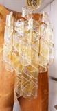 Lot 767:  Hanging Chandelier with Spiral Glass Elements. Clear & Amber Glass Curls. Six Extra Glass Elements. : Dimensions:  H: 26 inches: W: 16 inches: D: 16 inches --- 