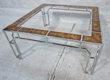 Lot 779:  MILO BAUGHMAN Chrome Asian Inspired Coffee Table. Burled Wood panels in thin square tube frame. Square Cocktail Table: Dimensions:  H: 16.25 inches: W: 36 inches: D: 36 inches --- 