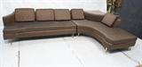Lot 789:  Brown Dunbar style Two Section Corner Couch. RICHARDS Sectional Sofa with Corner Table. Tapered metal legs. Brown silk Fabric. RICHARDS. : Dimensions:  H: 31 inches: W: 75 inches: L: 124 inches --- 