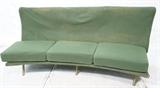 Lot 801:  ZANUSO for ARFLEX Curved Triennele Sofa Couch. Armless. Green Fabric on brass metal legs. Curved form with three seat cushions. : Dimensions:  H: 33 inches: W: 76 inches: D: 33 inches --- 