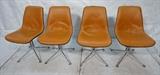 Lot 813:  4pc GIRARD style Shell Dining Chairs. Orange Seats. Chrome legs: Dimensions:  H: 31.5 inches: W: 18.5 inches: D: 20 inches --- 