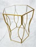 Lot 814:  Decorator Gilt Iron Side Table. Hexagonal table with antiqued gold finish. Inset glass top: Dimensions:  H: 27.75 inches: W: 23.5 inches: D: 20.5 inches --- 