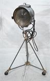 Lot 849:  Large Industrial Movie Film Spot Light. Brass & Steel frame on tripod base. Adjustable. Casters.  J.G McALISTER Inc. Hollywood, Calif. : Dimensions:  H: 66 inches: W: 40 inches: D: 31 inches --- 