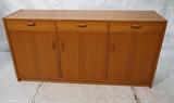 Lot 861:  Danish Modern Teak Credenza. Three drawers over three doors. Wood pulls: Dimensions:  H: 35 inches: W: 71 inches: D: 19 inches --- 
