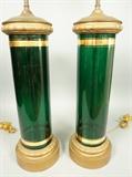 Lot 864:  Pr Antique Green Glass Column Form Table Lamps.Emerald glass with gold painted bands. Gilt wood trim. : Dimensions:  H: 35 inches: W: 8 inches: D: 8 inches --- 