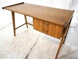 Lot 892:  American Modern Two Drawer Desk. "A' frame with back stretcher. Two drawers with brass pulls: Dimensions:  H: 29 inches: W: 45 inches: D: 23 inches --- 