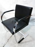 Lot 894:  BRNO Chromed Steel Lounge Chair. Black Leather Side Chair: Dimensions:  H: 31 inches: W: 21 inches: D: 23 inches --- 