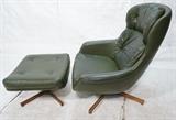 Lot 912:  SELIG Green Vinyl TAll Lounge Chair & Ottoman. Tufted upholstery. On Split Walnut "X" Bases.  Paper label.: Dimensions:  H: 38 inches: W: 32 inches: D: 32 inches --- 