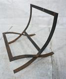 Lot 913:  Mies van de Rohe style Barcelona Chair frame. Heavy Iron.  Not marked: Dimensions:  H: 30 inches: W: 29.5 inches: D: 29 inches --- 
