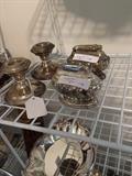 Some of the many pieces of sterling & silver plate