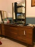 Sleek mid-century modern dresser with mirror