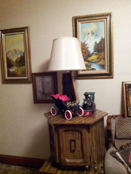 end tables, oil paintings, lamps, collector bottles.