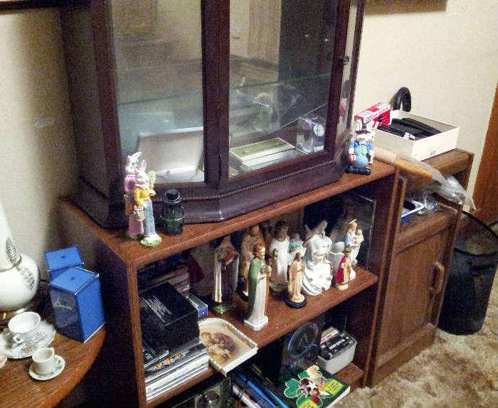 religious figurines, bookcase and more