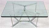 Lot#11, GEORGE NELSON & ASSOCIATES, CATENARY COFFEE TABLE, C. 1964, H 15", W 36" SQ., HERMAN MILLER.George Nelson & Associates for Herman Miller, Catenary coffee table, model no. 6371. Raised on a chrome-plated steel base with a square glass top. Measuring H. 15" x 36" x 36", circa 1963 to 1968.
