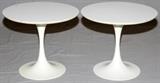 Lot#13, STYLE OF EERO SAARINEN TULIP TABLES, MID 20TH C., PAIR, H 15" DIA 18"Each side table has a round white laminate top on a white enameled metal base.  No apparent markings. Measuring H. 15" x 18", mid 20th Century.