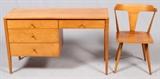 Lot#14, PAUL MCCOBB DESK AND CHAIR, CIRCA 1950'S H 28", W 48", D 18"Having three drawers on the left side with a single on the right accompanied by a captain style chair with a splat back.