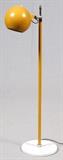 Lot#24, ITALIAN MID CENTURY MODERN FLOOR LAMP, C. 1950-60, H 50", STILNOVO STYLE.In the style of Stilnovo. Raised on a round marble base, featuring a yellow shaft, fitted with a single telescoping light inside a globular form metal shade. Marked, "Made in Italy" at the underside. Measuring H. 50", circa 1950 to 1960.